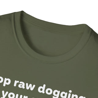 Close-up of a green t-shirt with white text on a white background