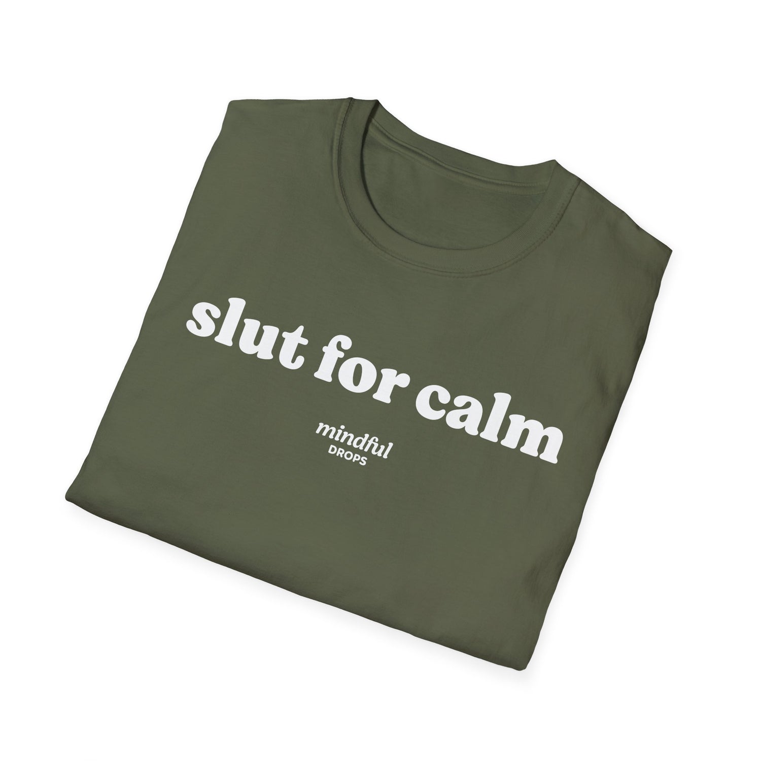 Folded green t-shirt with 'slut for calm' text on a white background