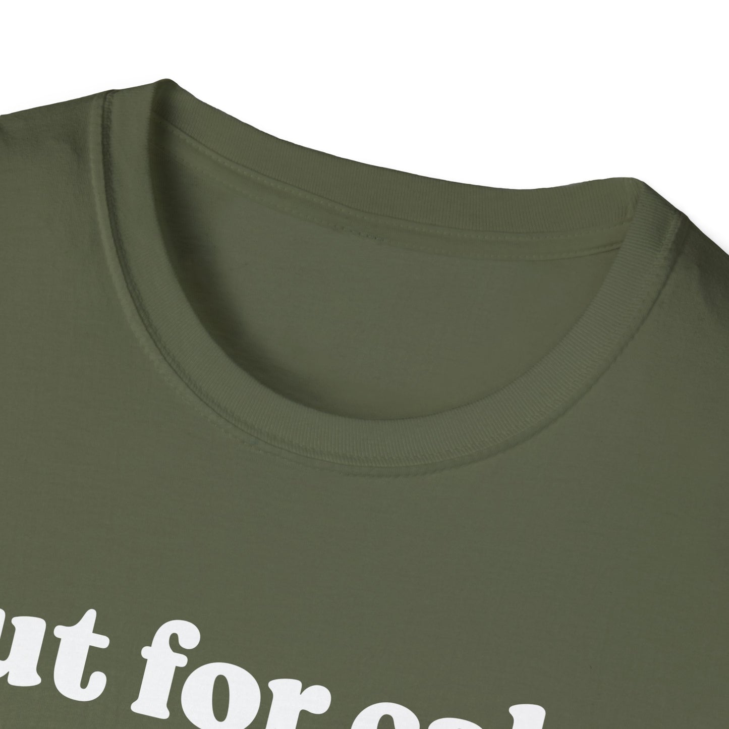 Close up of green shirt with white text on a white background