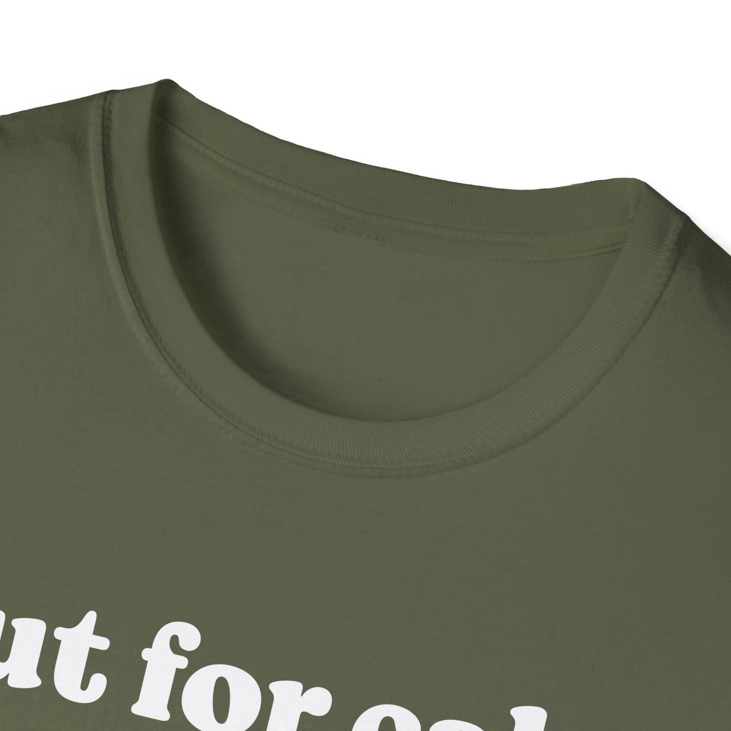 Close up of green shirt with white text on a white background