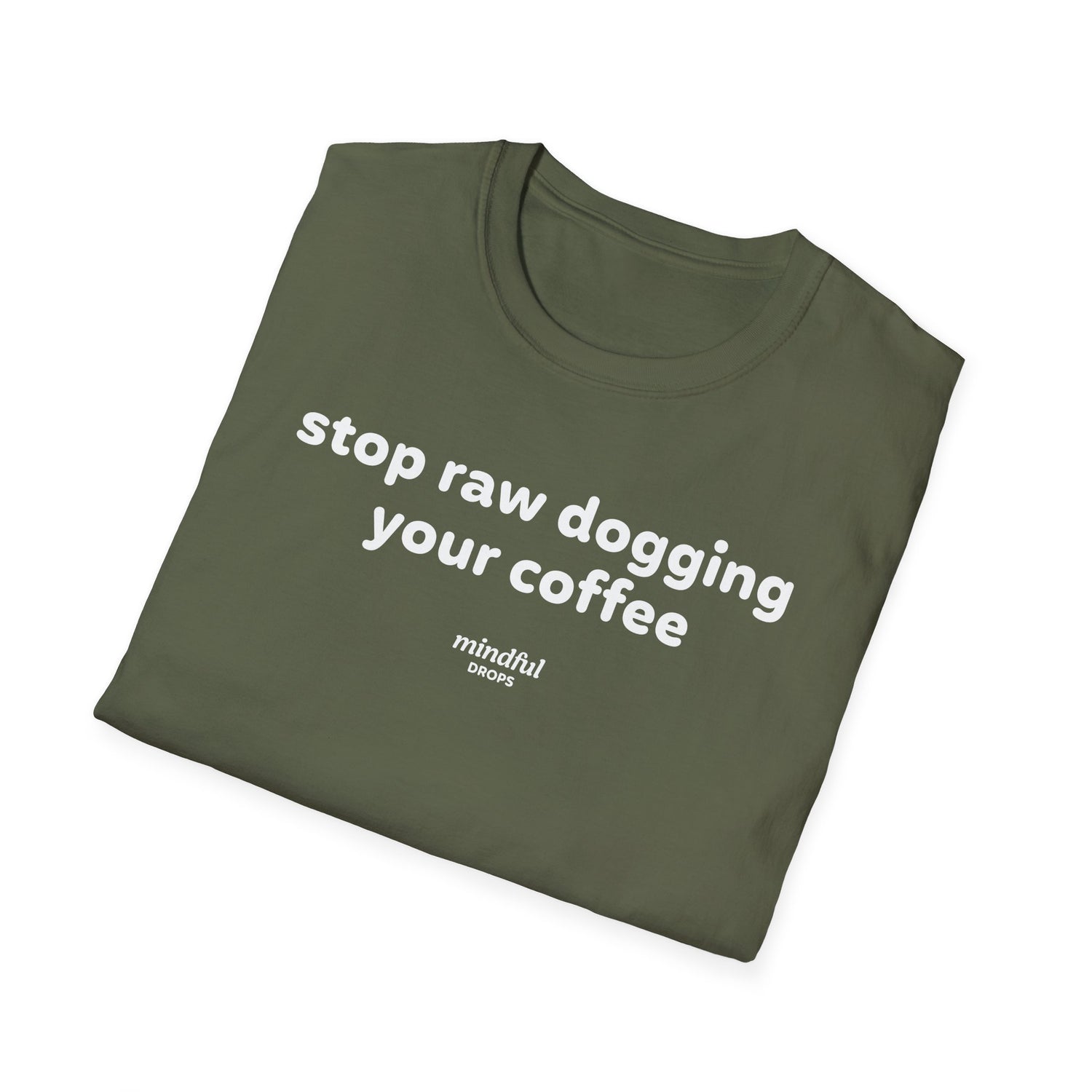 Folded green t-shirt with white text 'stop raw dogging your coffee' on a white background